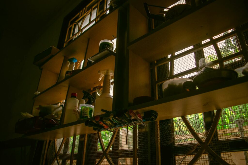 indoor shelves with kitchen supplies and tools
